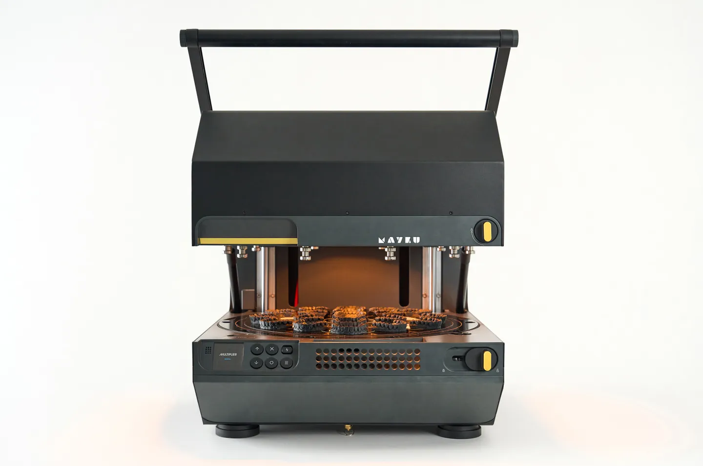 Mayku Multiplier open with teeth on plate