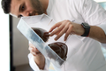 Chocolatier Philip Khoury using a Makyu-made chocolate mold